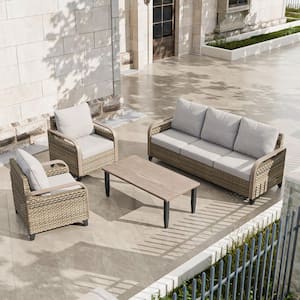 4-Piece Brown Wicker Outdoor Patio Conversation Set 3-Seat Sofa, Lounge Chairs with Gray Cushions and Coffee Table