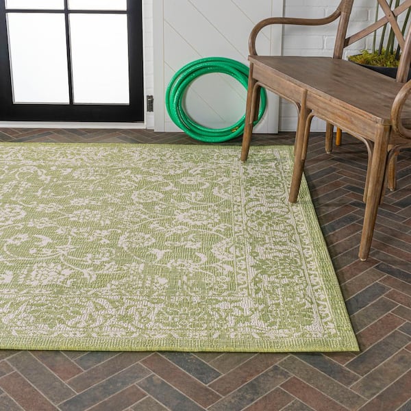 https://images.thdstatic.com/productImages/276c3977-b772-4758-ba67-21167aa19b59/svn/green-cream-jonathan-y-outdoor-rugs-smb100d-9-a0_600.jpg