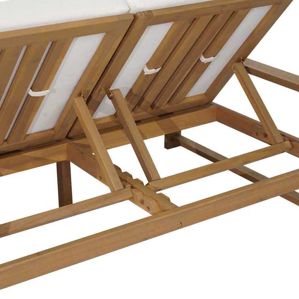 Close-up of the adjustable teak wood backrest mechanism and cushion ties.