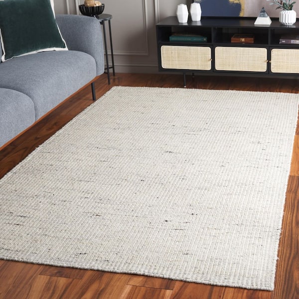 Mirage 6 ft. x 9 ft. Beige/Black Speckled Solid Area Rug