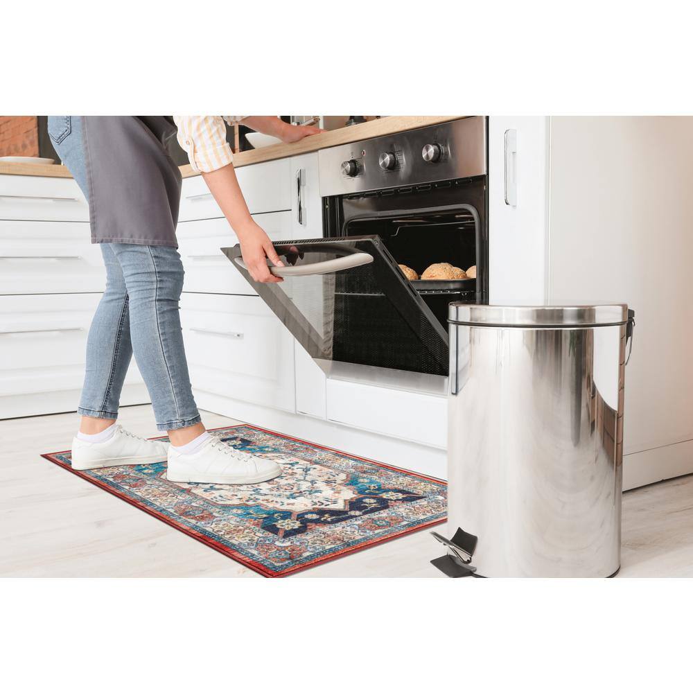 Ivory and Navy Medallion Washable Synthetic Area Rug 2' x 3'