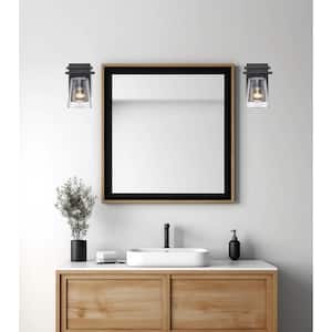Iris 1-Light Black Indoor Wall Sconce Light Fixture with Clear Glass Shade