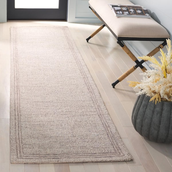 Ebony 2 ft. x 9 ft. Gray Solid Border Abstract Runner Rug