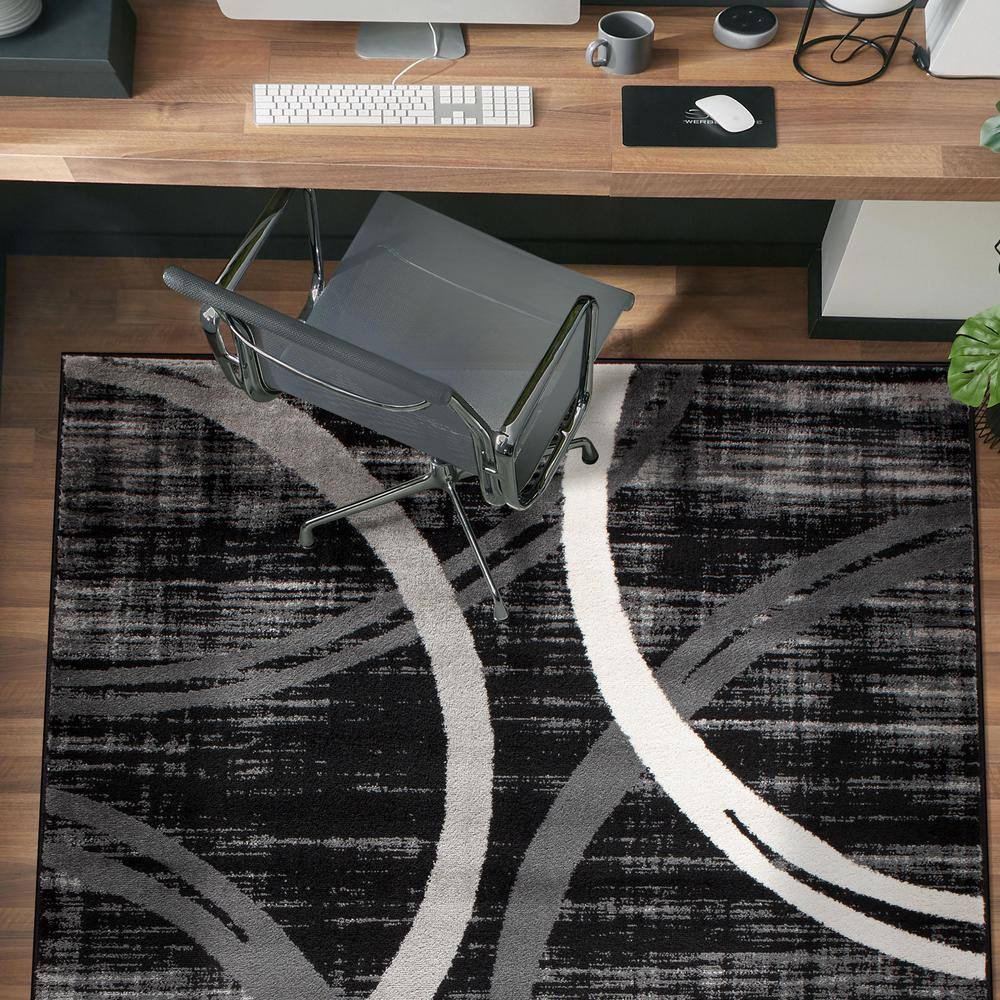 Modern Black and Gray Abstract Oval Area Rug, 5' x 7'