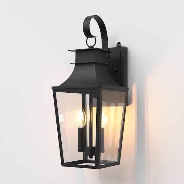 Hawaii 21 in. H Black Clear Glass Hardwired Dusk to Dawn Outdoor Wall Lantern Sconce