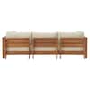 Outdoor sofa set and coffee table arrangement in a living area.