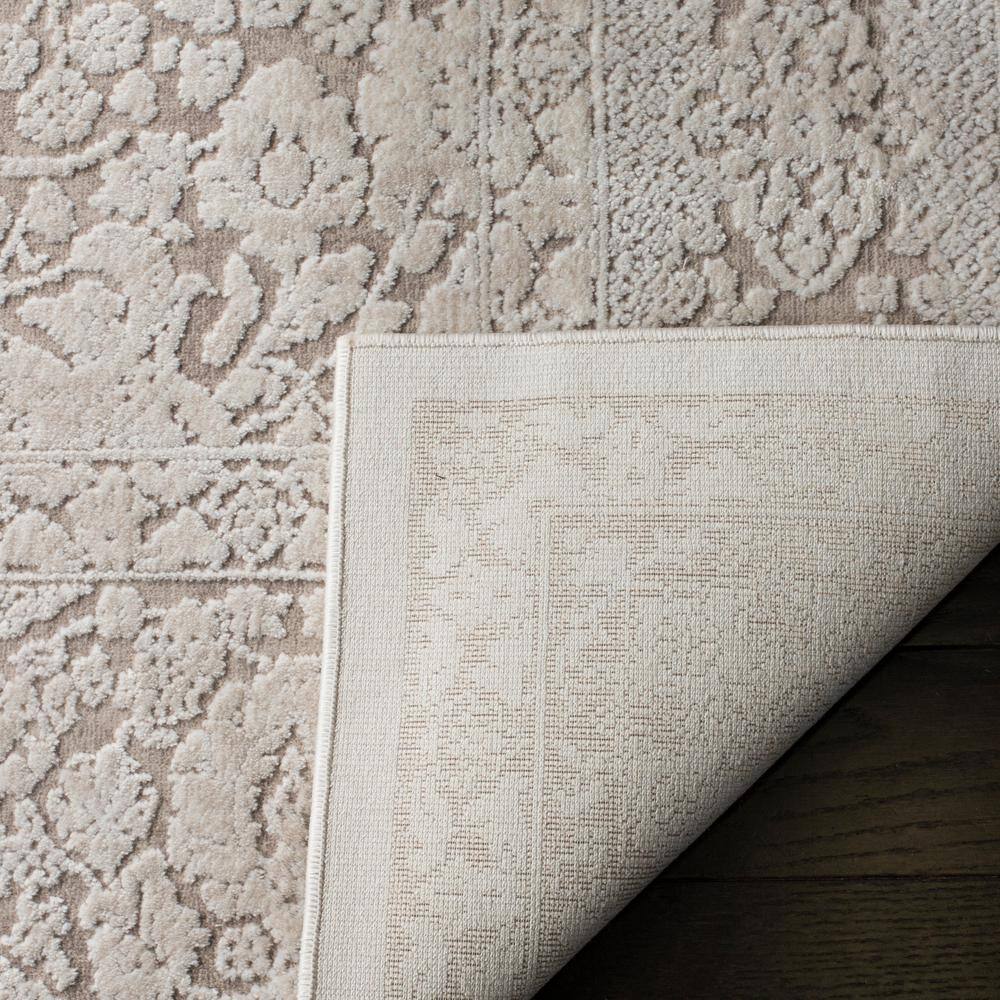 Elegant Floral Etched Beige/Cream 8' x 10' Synthetic Area Rug