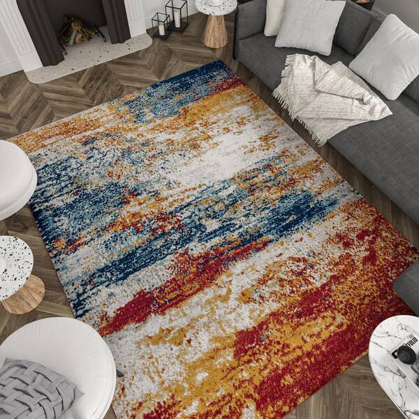 https://images.thdstatic.com/productImages/27e6e7f0-5a47-45ae-ad47-394b34d851e4/svn/multi-color-tayse-rugs-area-rugs-dia1500-5x8-fa_600.jpg