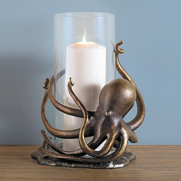 https://images.thdstatic.com/productImages/27f9e5a6-426f-4fc9-9b00-7bf410f58305/svn/bronze-candle-holders-34632-31_600.jpg