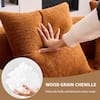 Close-up of wood grain chenille fabric and memory foam cushions.