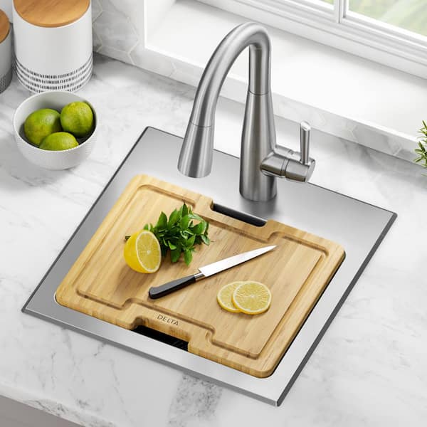 https://images.thdstatic.com/productImages/2802c0c2-fce6-4e6d-83bf-a54cfe652db3/svn/stainless-steel-delta-drop-in-kitchen-sinks-95a9335-15s-ss-2a-a0_600.jpg