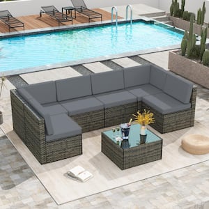 7-Piece Rattan 6-Person Wicker Outdoor Sectional Seating Group with Dark Gray Cushions and Glass Table Furniture Sets