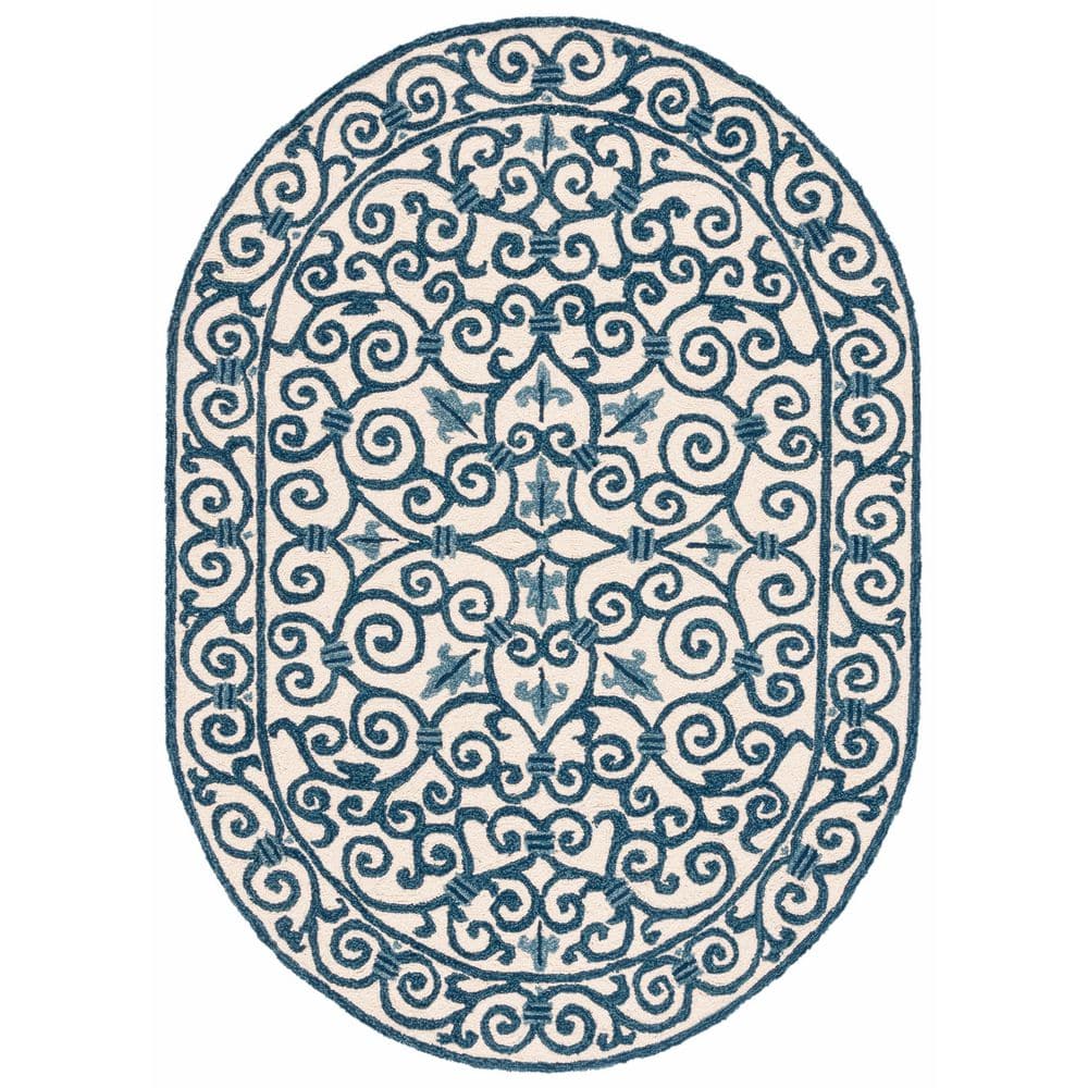 SAFAVIEH Chelsea Ivory/Dark Blue 8 ft. x 10 ft. Interlaced Floral Border Oval Area Rug 100% pure virgin wool pile, hand-hooked to a durable cotton backing. American Country and turn-of-the-century European designs. This collection is handmade in China exclusively for SAFAVIEH. This is a great addition to your home whether in the country side or busy city. Color: Ivory/Dark Blue.