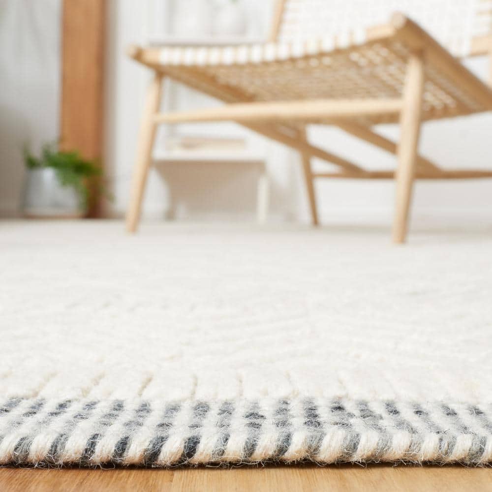Ivory Tufted Rectangular Wool Area Rug, 5 ft. x 8 ft.