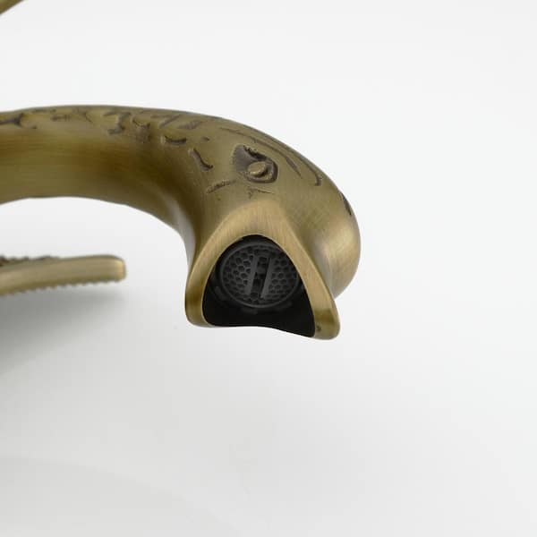 Swan Neck Single Handle Single Hole Bathroom Faucet in Antique Brass with Pop-Up Drain