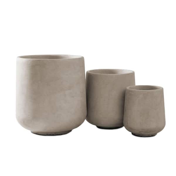 Photo 1 of **ONE HAS MAJOR DAMAGE**
17.3 in., 13.4 in. & 10.6 in. H Round Weathered Concrete Planter, Outdoor Indoor Large Containers w/Drainage Holes Set-3