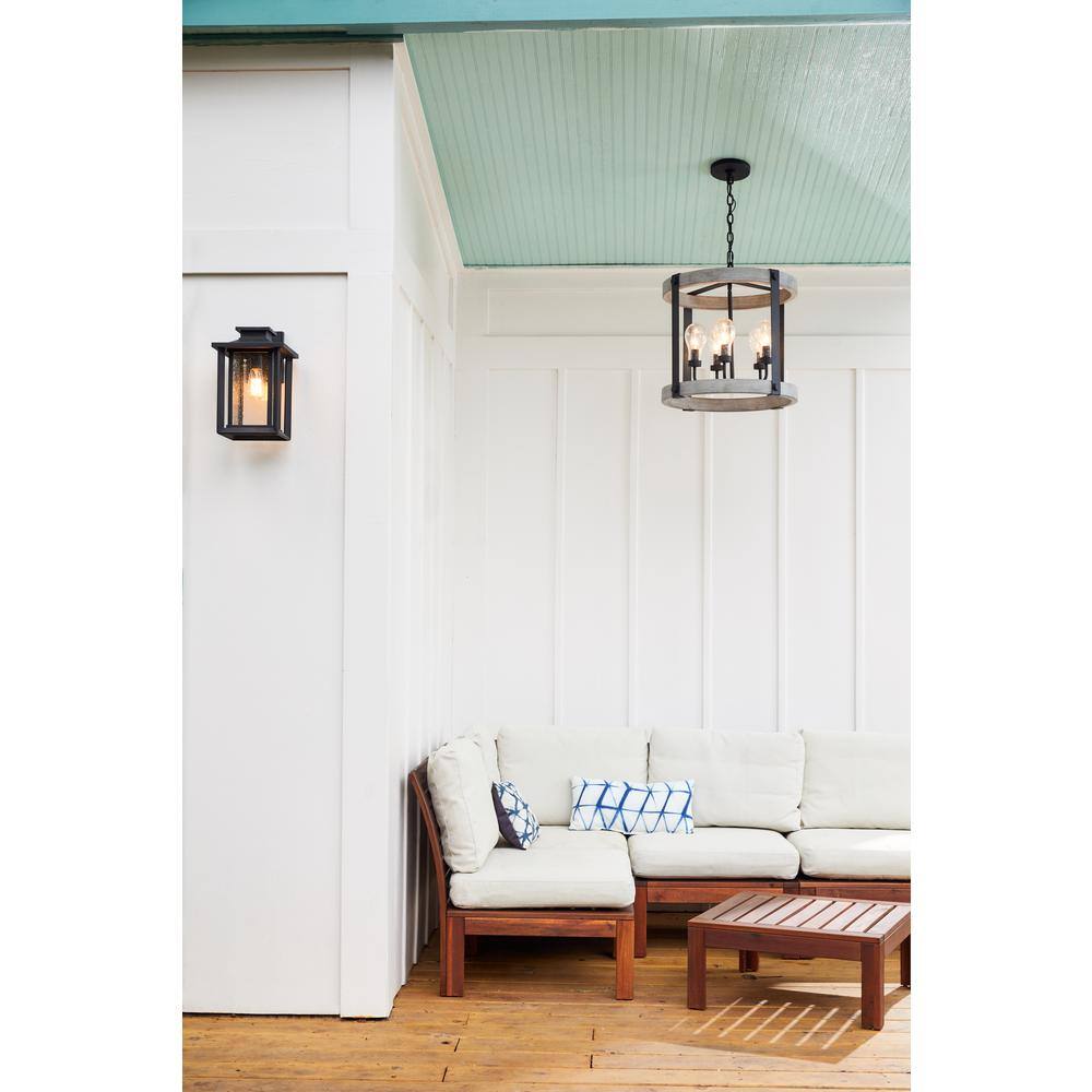 Wakefield Black Iron Outdoor Wall Lantern with Clear Seedy Glass