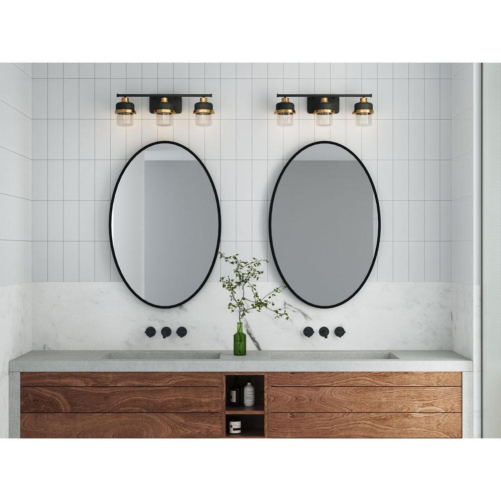 Beckner Collection 24.12 in. 3-Light Matte Black Clear Glass Urban Industrial Vanity Light with Vintage Brass Accents price history on PriceWatchPro