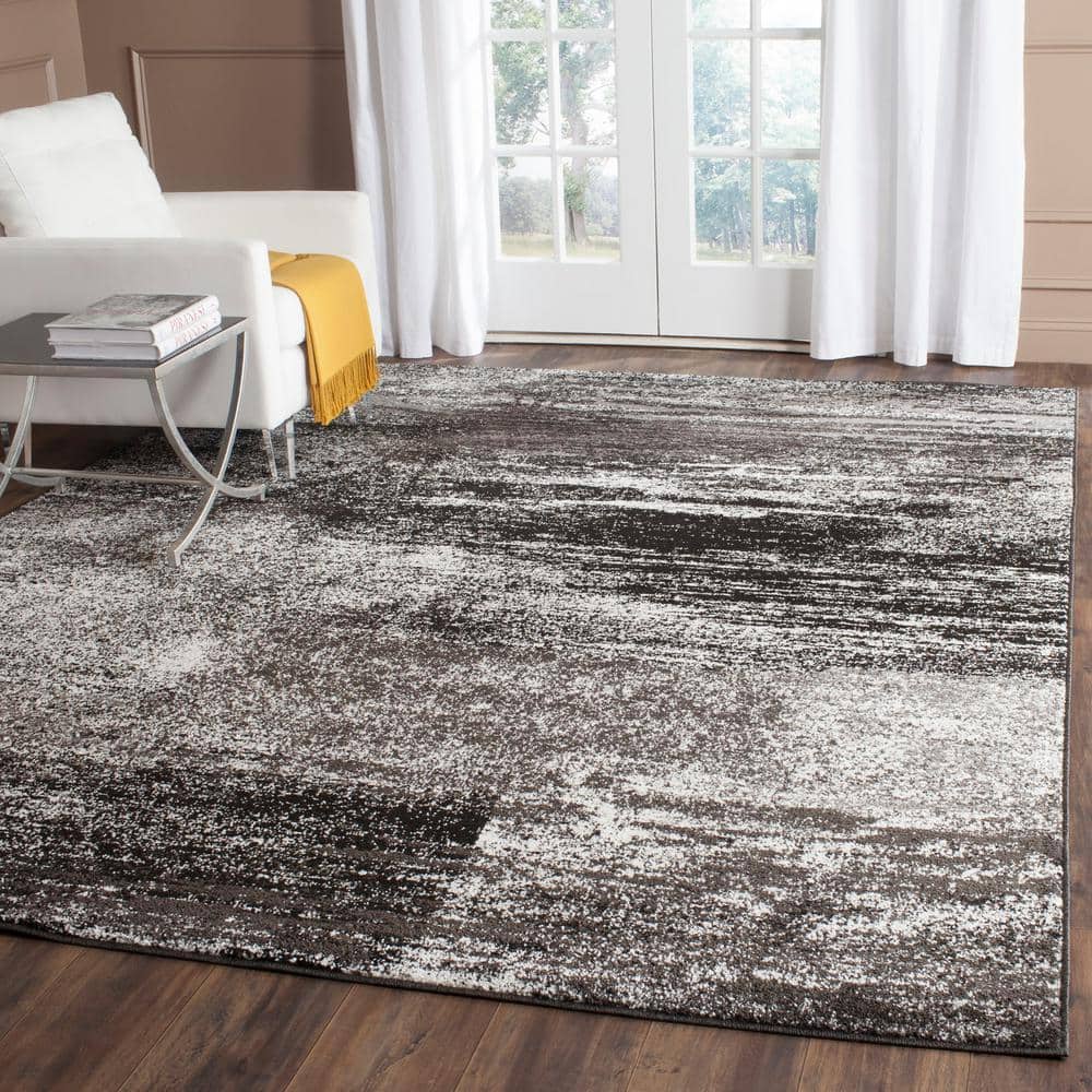 Silver and Black Abstract Synthetic Area Rug, 54" x 16"