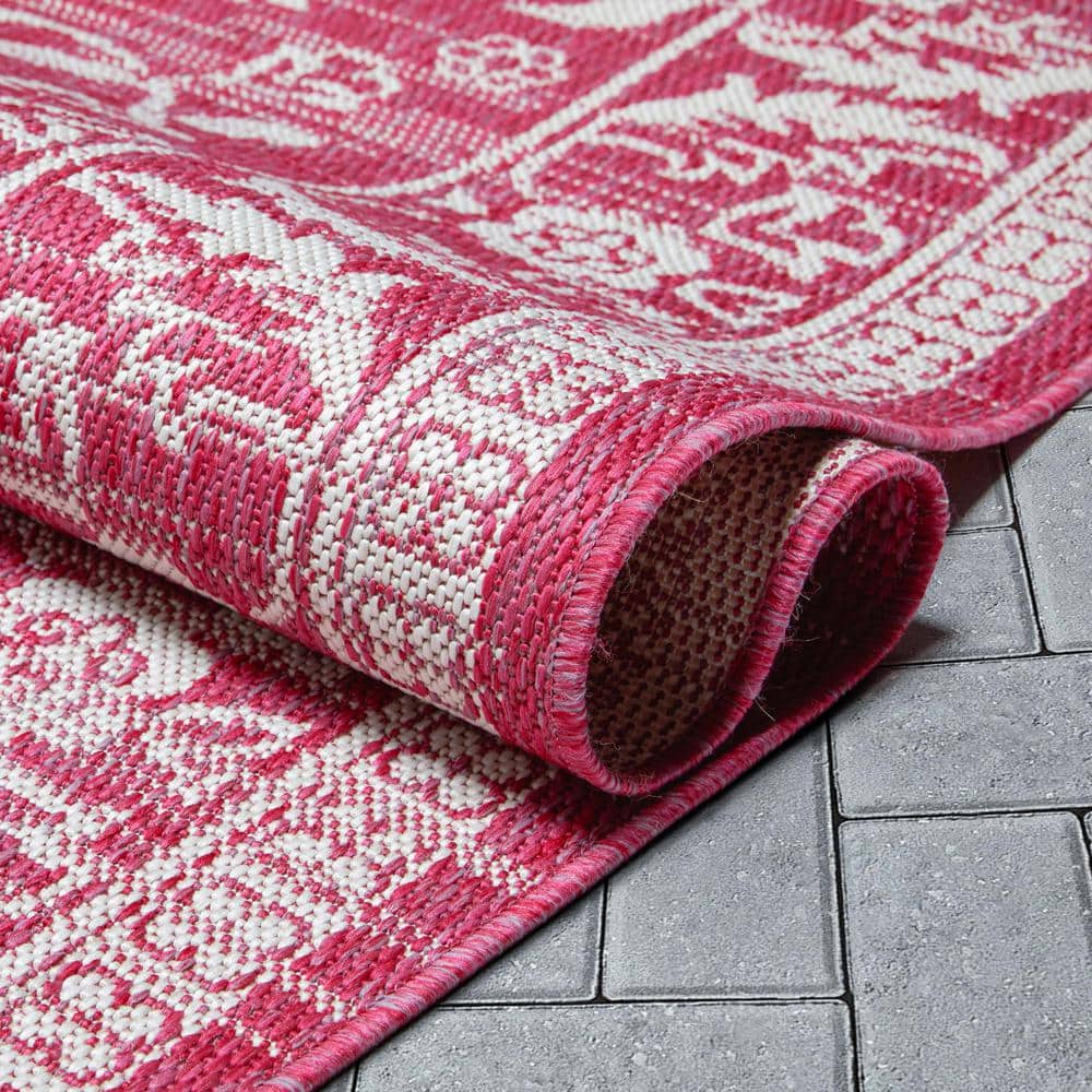 Fuchsia and White Synthetic 5' x 7' Reversible Area Rug
