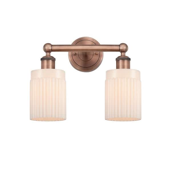 Hadley 13.5 in. 2-Light Antique Copper Vanity Light with Glass Shade