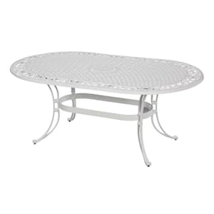 Sanibel White 9-Piece Cast Aluminum Oval Outdoor Dining Set with Green Cushions and Umbrella