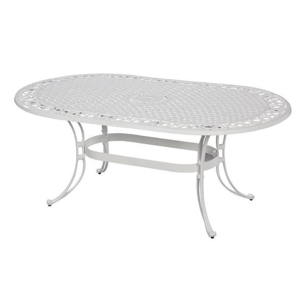 HOMESTYLES Sanibel White 9-Piece Cast Aluminum Oval Outdoor Dining Set with Green Cushions and Umbrella