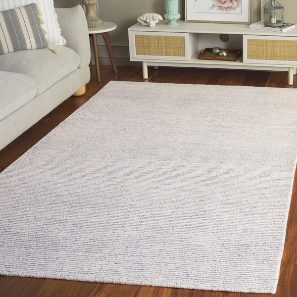 Abstract 6 ft. x 9 ft. Ivory/Silver Modern Distressed Area Rug
