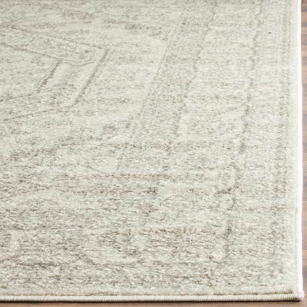 Elegant Ivory and Silver 12' Square Synthetic Easy-Care Rug