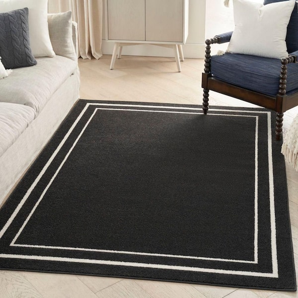 Essentials Black Ivory 5 ft. x 7 ft. Solid Contemporary Indoor/Outdoor Area Rug