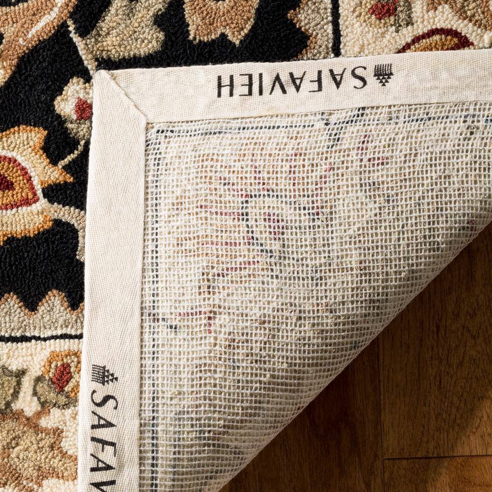 Black and Ivory Floral Hand-Hooked Rectangular Area Rug