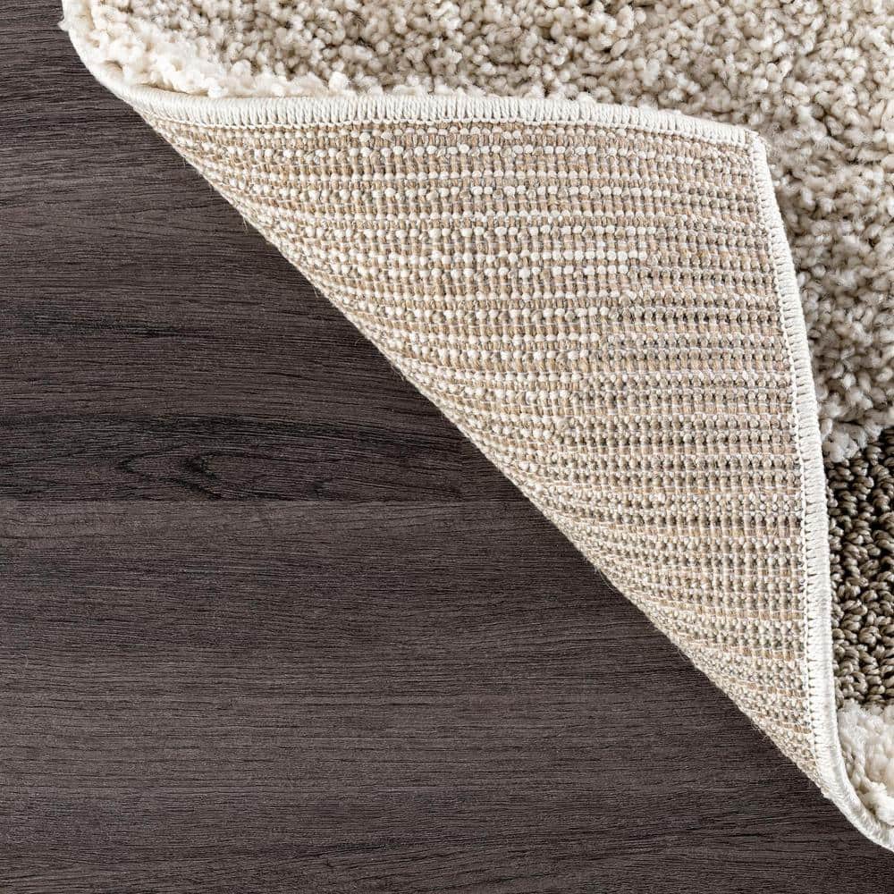 Cream and Beige Synthetic Shag Area Rug, 9' 2" x 12'
