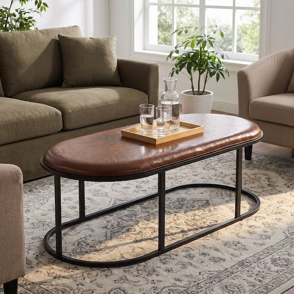 Allan 55.12 in. Vintage Brown Oval PU Leather Top Coffee Table with Metal Frame, Modern Industrial Accent Table