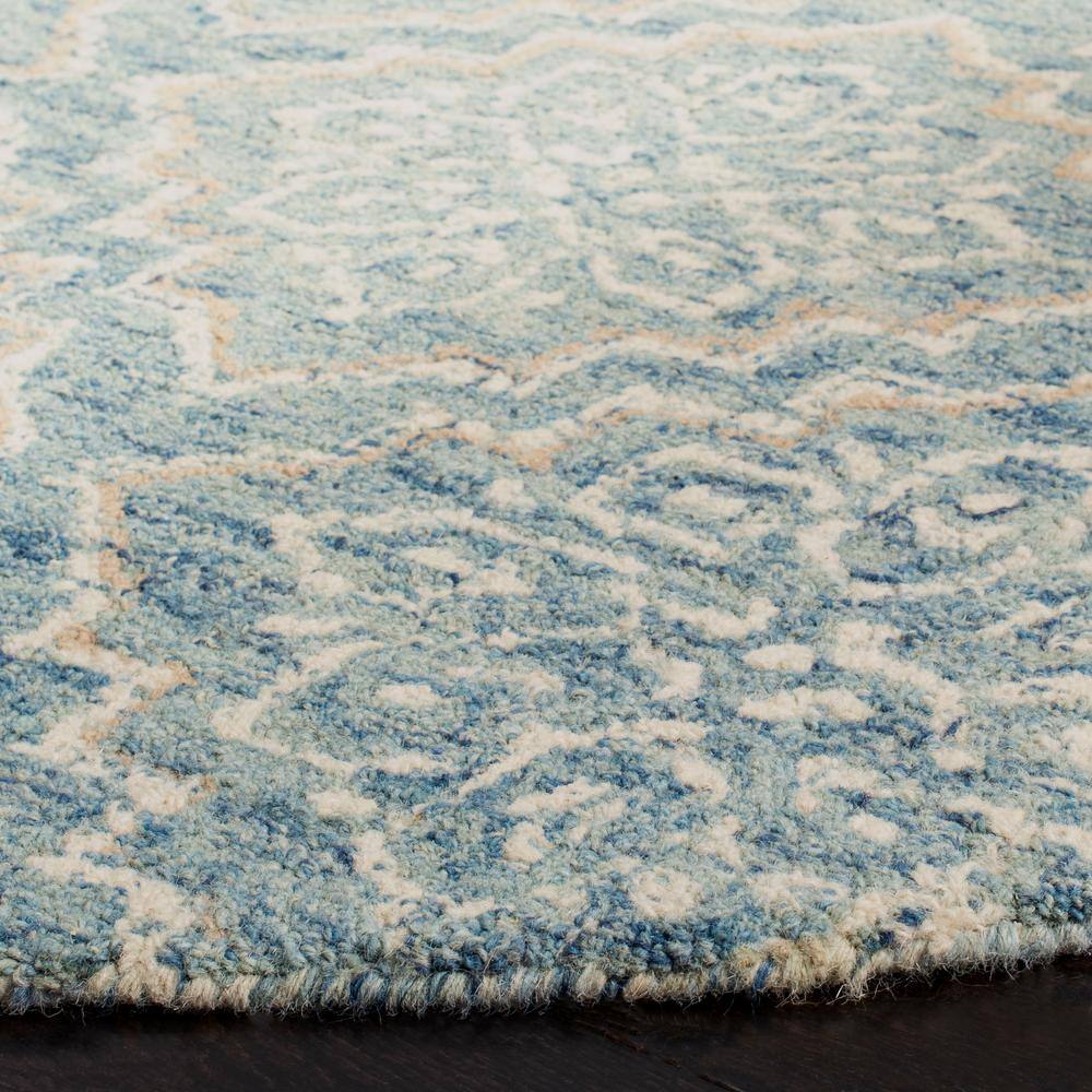 Handmade Abstract Blue Wool 47" Round Tufted Rug