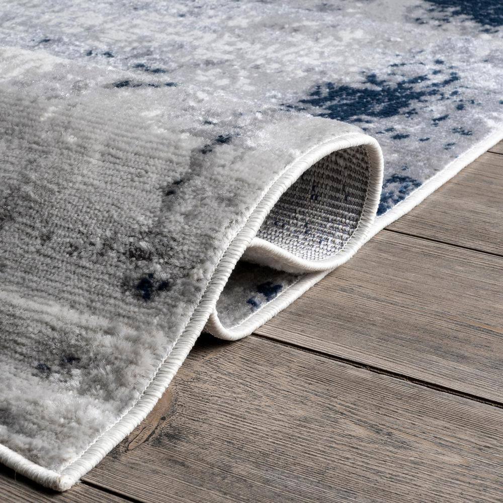Madalynn Abstract Blue Synthetic 4' x 6' Area Rug