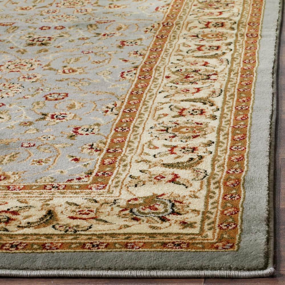 Lyndhurst Light Blue and Ivory Synthetic 10' x 14' Rectangular Area Rug