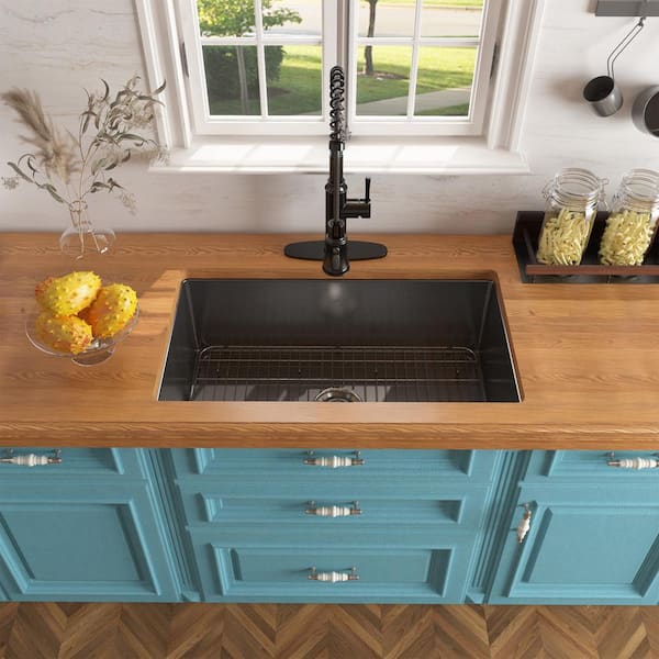 https://images.thdstatic.com/productImages/29060da8-d5db-4d28-baf8-ad76b3f049b7/svn/matte-black-fireclay-kitchen-sink-with-matte-black-pull-down-kitchen-faucet-casainc-undermount-kitchen-sinks-kcsl0018-ub32mb-40_600.jpg
