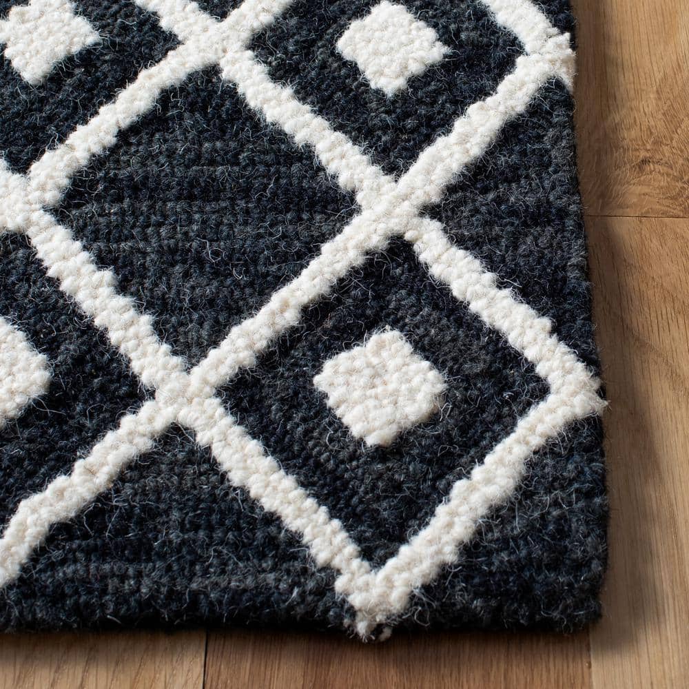 Black and Ivory 8' x 10' Handmade Wool Tufted Area Rug
