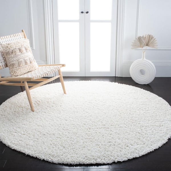 August Shag Ivory 5 ft. x 5 ft. Solid Round Area Rug
