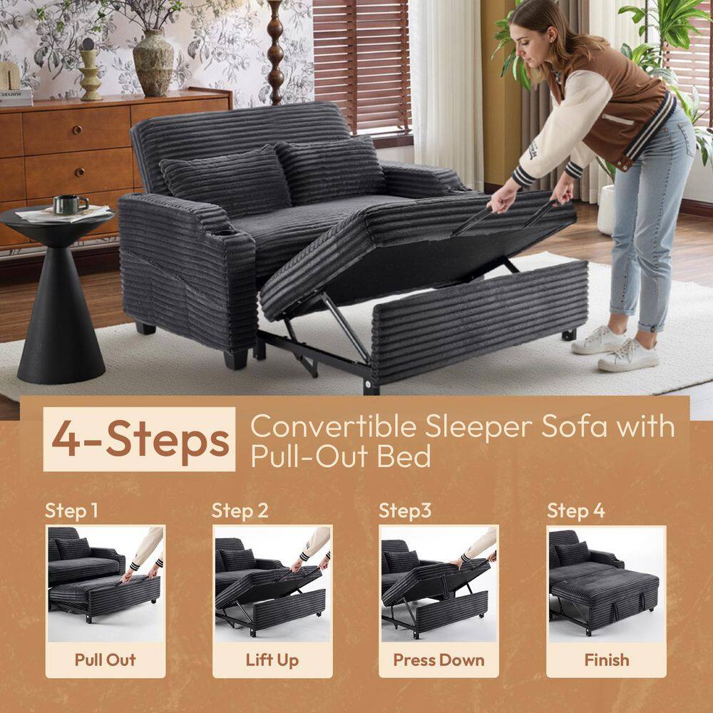 Person cleaning the pull-out sofa bed.