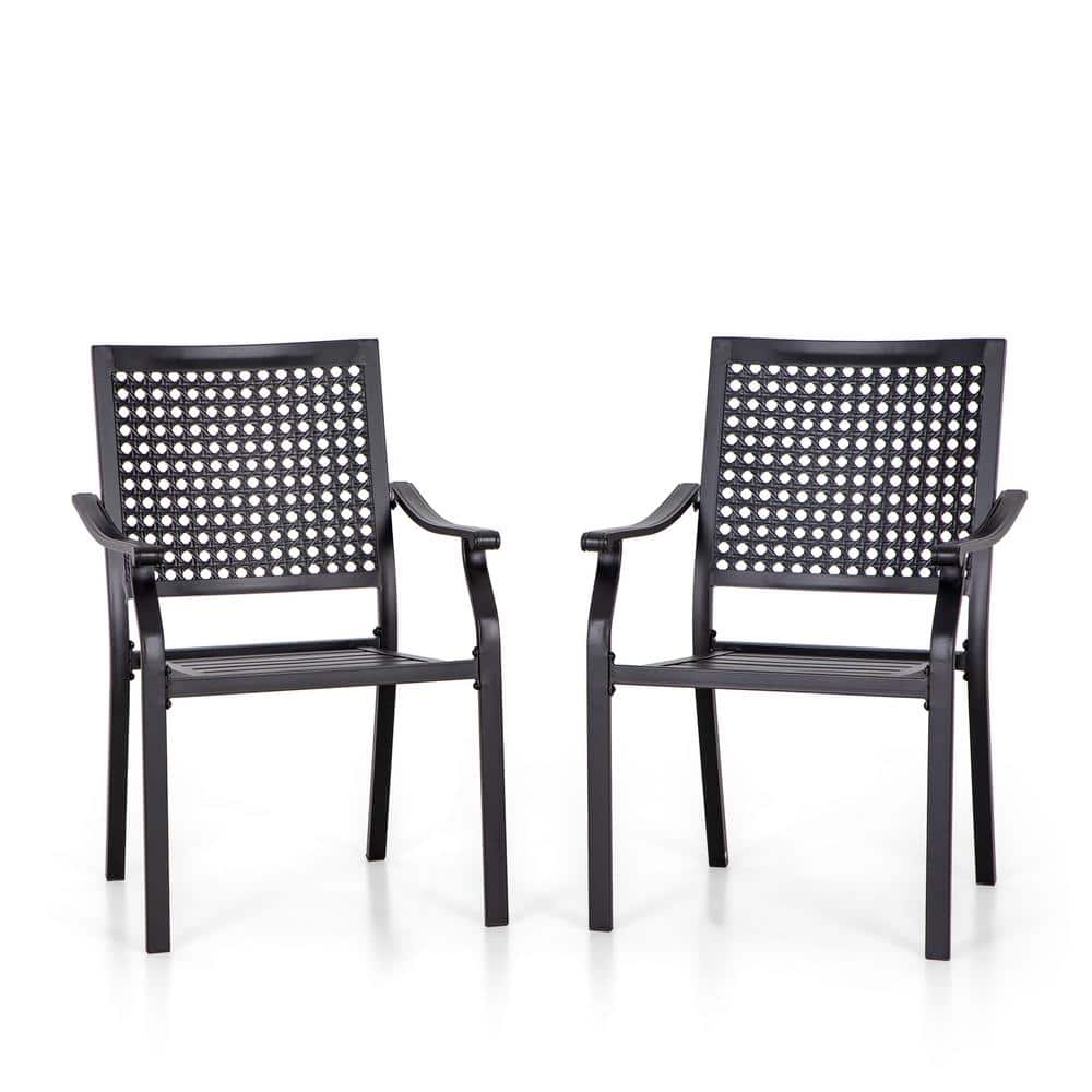 Two black metal patio chairs with lattice backrests.