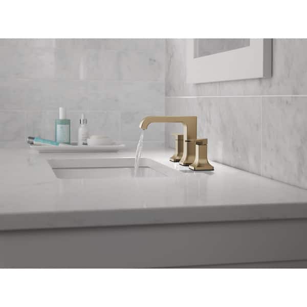 Velum Gold 8 in. Widespread Double Handle Bathroom Faucet with Drain Kit Included in Champagne Bronze