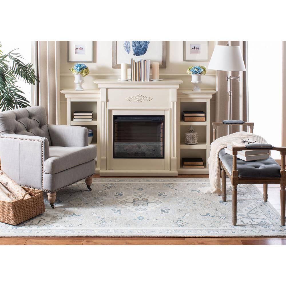 Light Grey and Ivory Handmade Wool 8' x 10' Tufted Rug