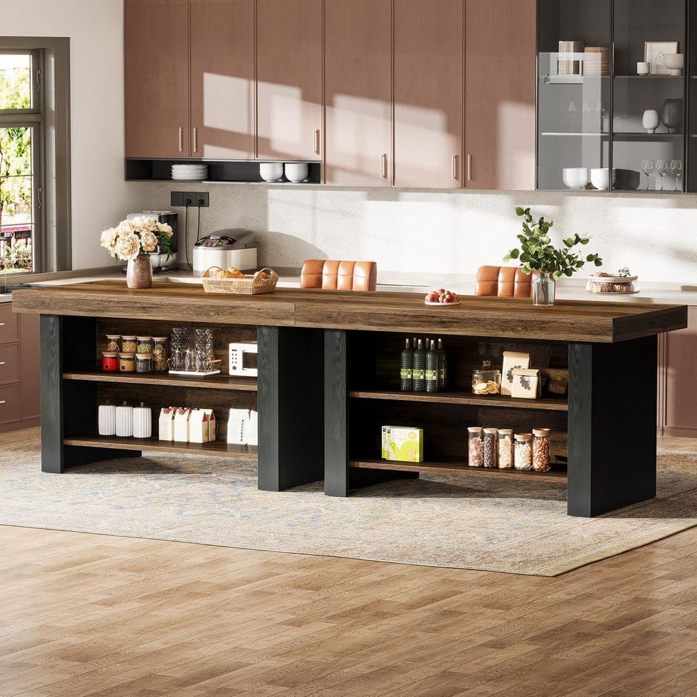 Long kitchen island with a dark wood top and black base featuring multiple open shelves.