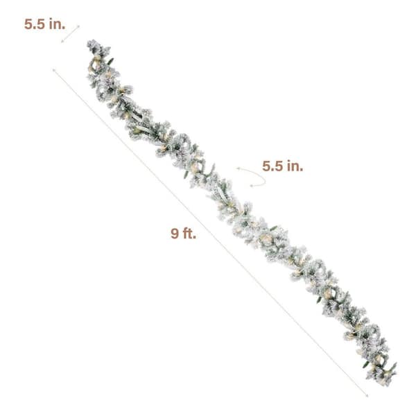 9 ft. Green Battery Operated Prelit Mountain Pine Flocked Artificial Christmas Garland with 50 Warm White LED Lights