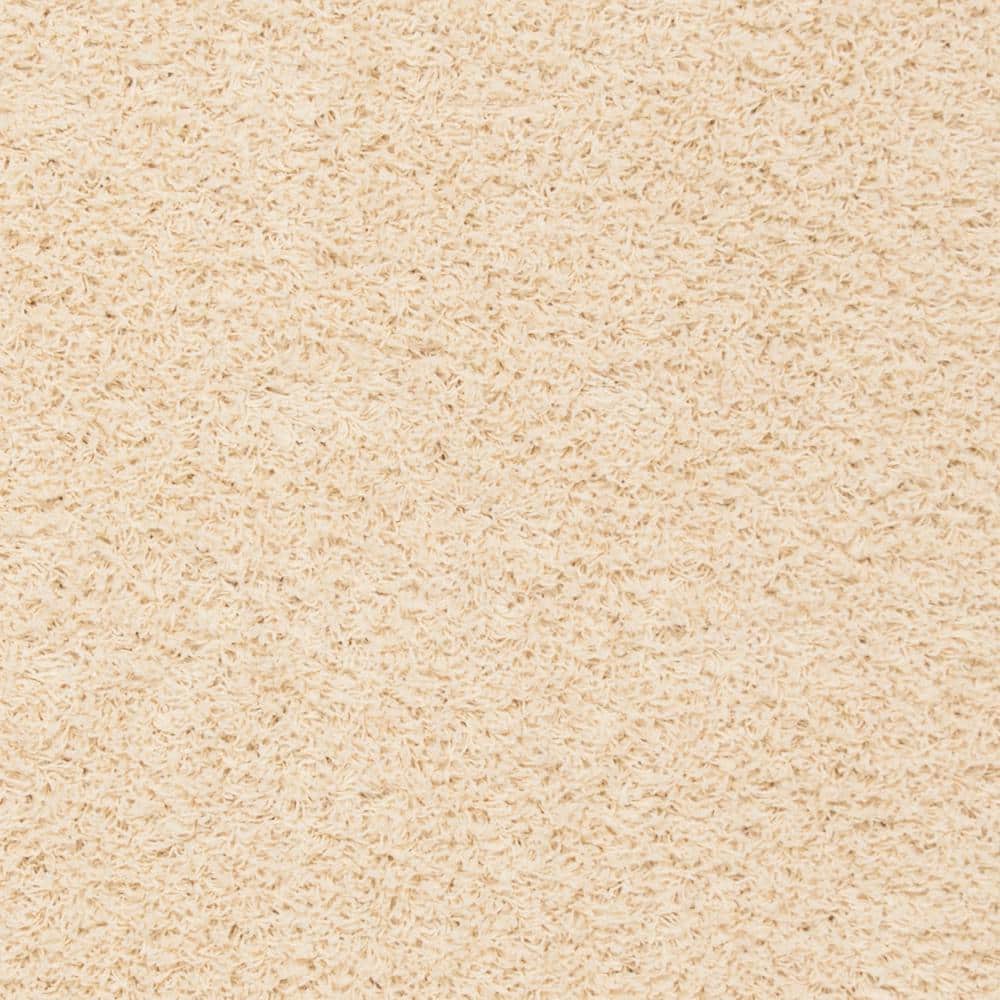 Ivory 9' x 12' Shag Wool and Synthetic Rug