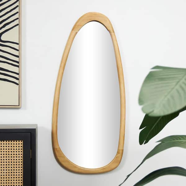 Litton Lane 42 in. x 19 in. Oval Asymmetrical Framed Brown Wall Mirror