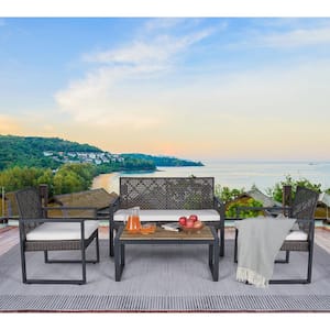 4-piece rattan wicker patio outdoor furniture set, garden backyard lawn with wooden tabletop, brown and beige cushions