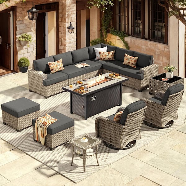 XIZZI Jubilation 15 Pieces Wicker Outdoor Patio Rectangular Fire Pit Set and Swivel Rocking Chairs with Black Cushions