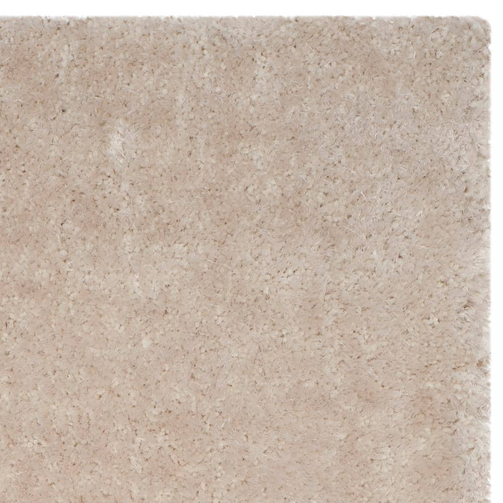 Ivory 5' x 8' Hand Tufted Shag Area Rug